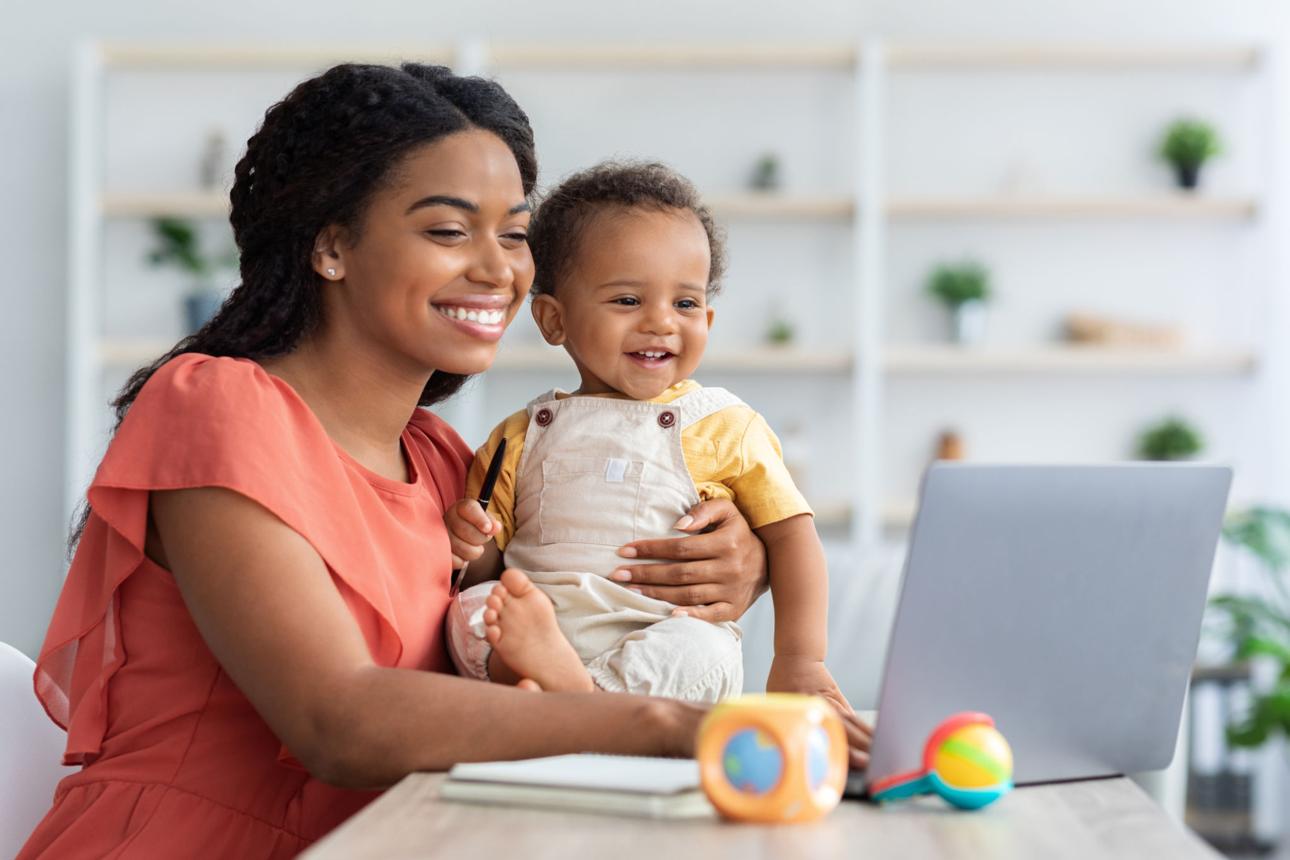 Mother using AI tools to track baby milestones